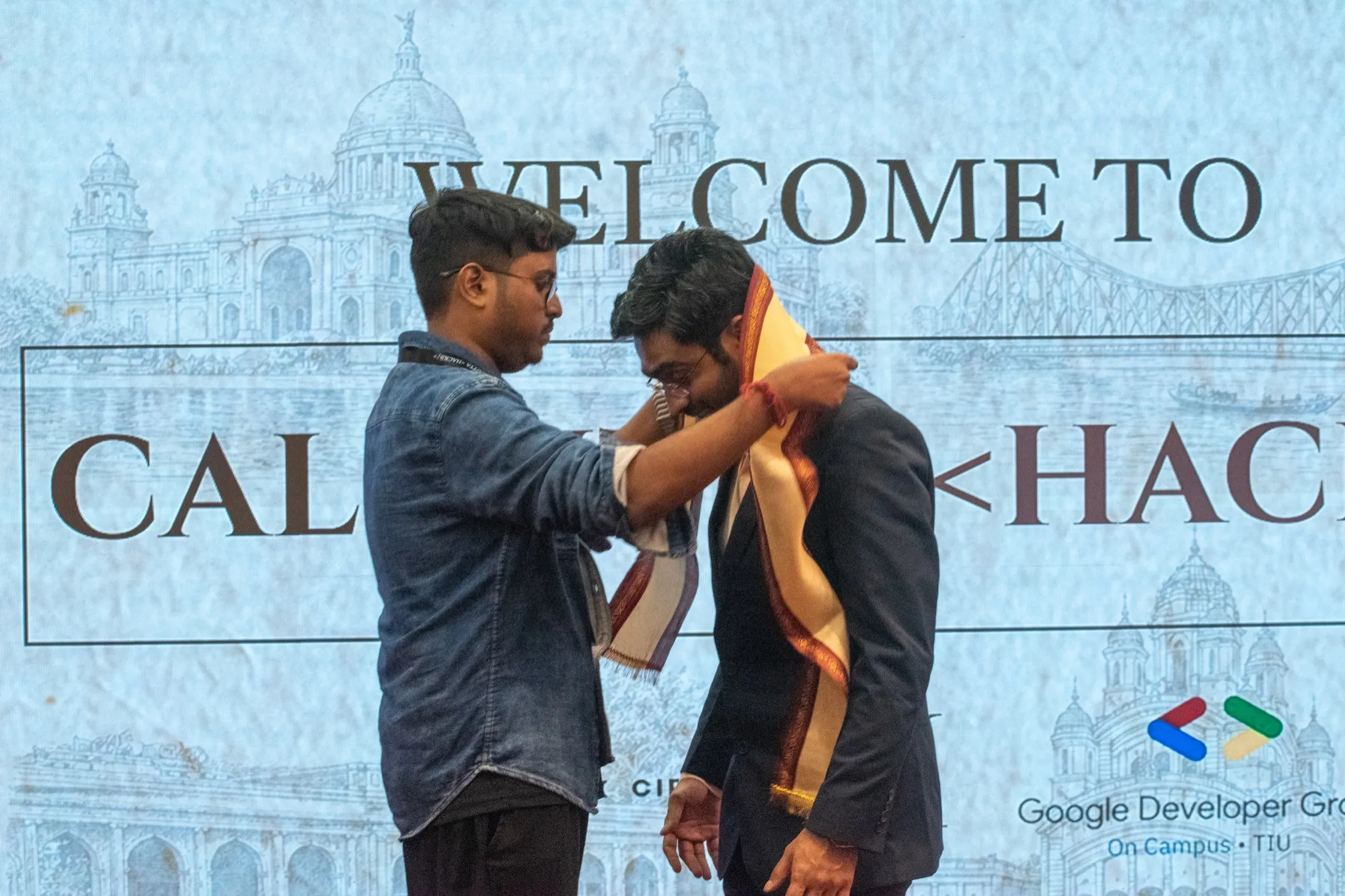 Felicitation, with an uttariya